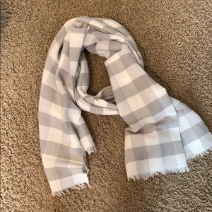 White and gray fleece scarf.